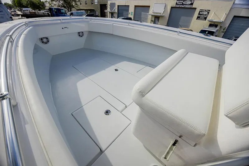  Yacht Photos Pics 2024 Contender 28 Tournament boat interior with spacious seating and storage compartments.