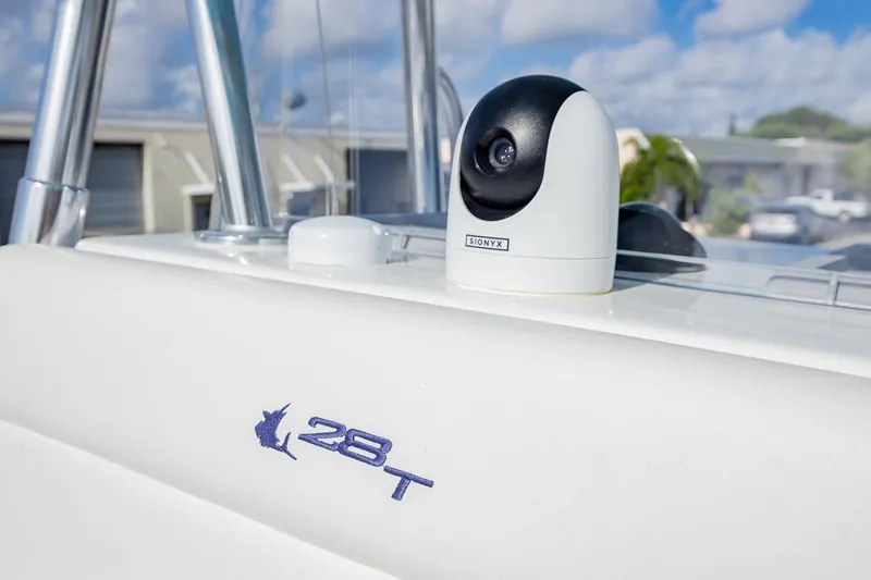  Yacht Photos Pics 2024 Contender 28 Tournament boat with security camera on deck.