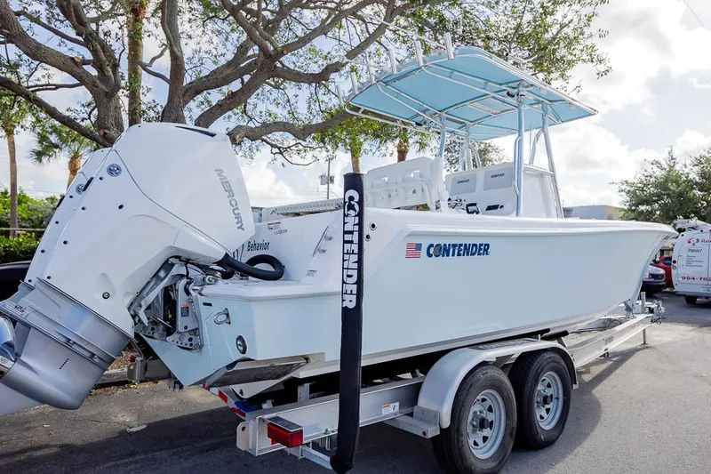  Yacht Photos Pics 2024 Contender 28 Tournament boat on trailer, featuring Mercury outboard engine.