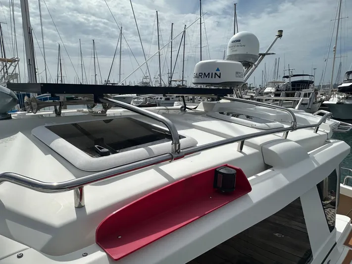 Cutwater 28 Yacht Photos Pics 2016 Cutwater 28 boat with Garmin radar, docked in a marina with sailboats.