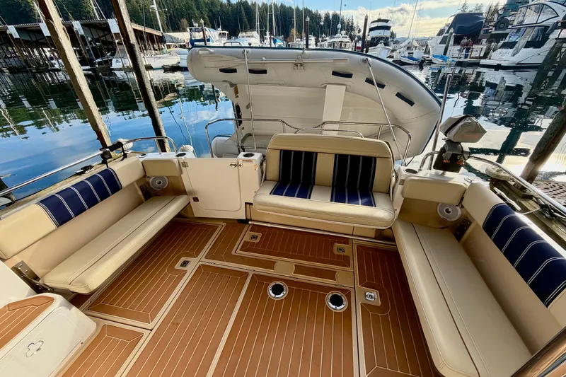 Bon Courage Yacht Photos Pics 2018 Ranger Tugs R-29 CB boat interior with seating, docked at marina.