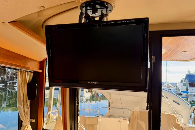 Bon Courage Yacht Photos Pics Interior of 2018 Ranger Tugs R-29 CB with mounted Furrion TV.