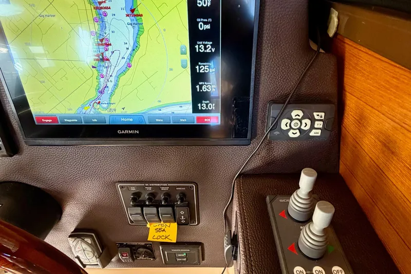 Bon Courage Yacht Photos Pics 2018 Ranger Tugs R-29 CB helm with Garmin navigation display and control panel.