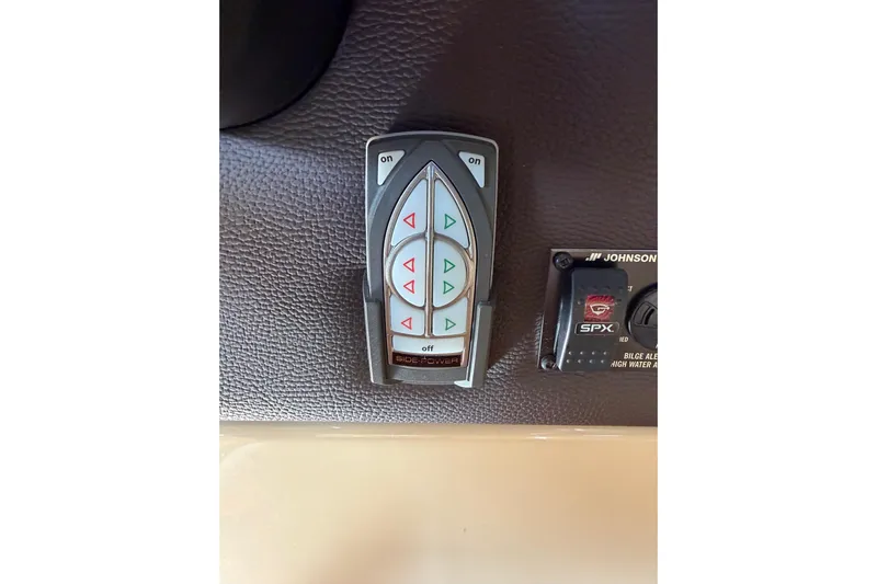 Bon Courage Yacht Photos Pics Control panel on 2018 Ranger Tugs R-29 CB boat dashboard with buttons and switches.