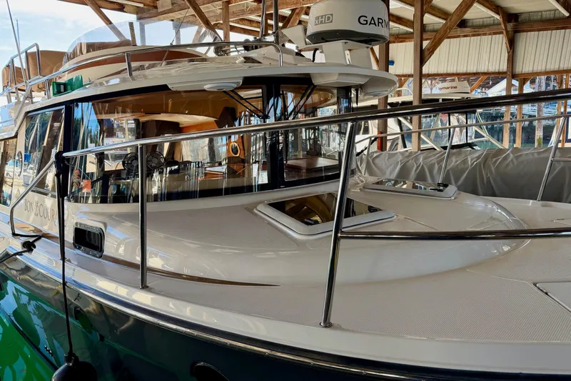 Bon Courage Yacht Photos Pics 2018 Ranger Tugs R-29 CB boat docked in a covered marina.