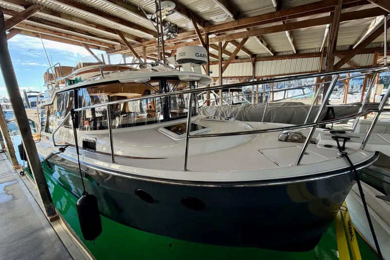 Bon Courage Yacht Photos Pics 2018 Ranger Tugs R-29 CB boat docked in a covered marina.