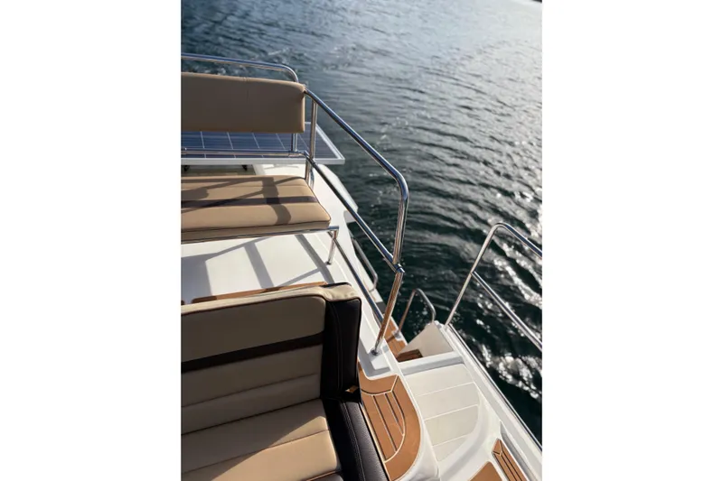 Bon Courage Yacht Photos Pics 2018 Ranger Tugs R-29 CB boat deck with seating, overlooking water.