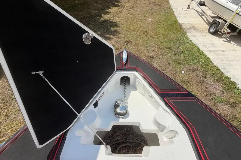  Yacht Photos Pics Open anchor compartment on 2018 Statement 380 Open boat, showing chain and rope.