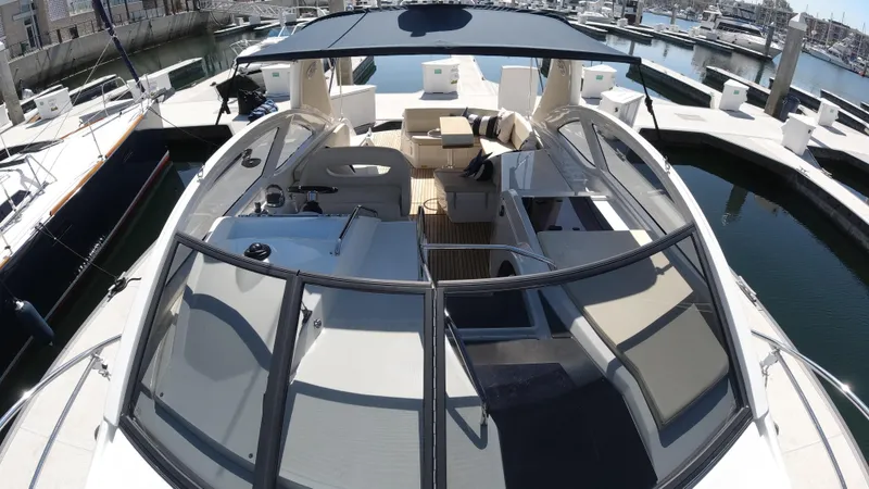  Yacht Photos Pics 2016 Beneteau GT35 yacht with spacious deck and modern amenities docked at marina.