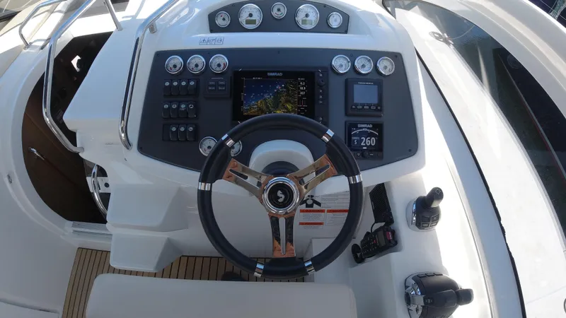  Yacht Photos Pics 2016 Beneteau GT35 helm with advanced navigation and control systems.