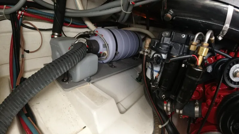  Yacht Photos Pics Engine compartment of a 2016 Beneteau GT35 boat showing various mechanical components.