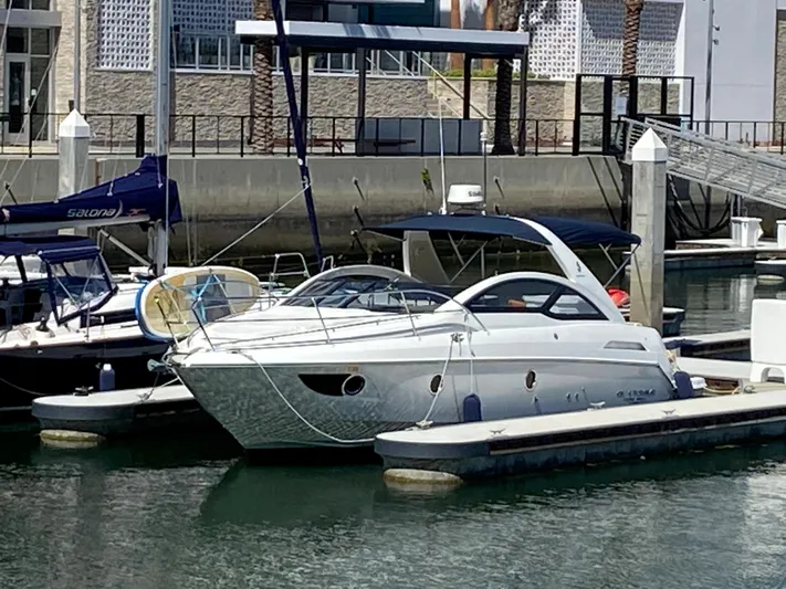  Yacht Photos Pics 2016 Beneteau GT35 yacht docked at a marina.