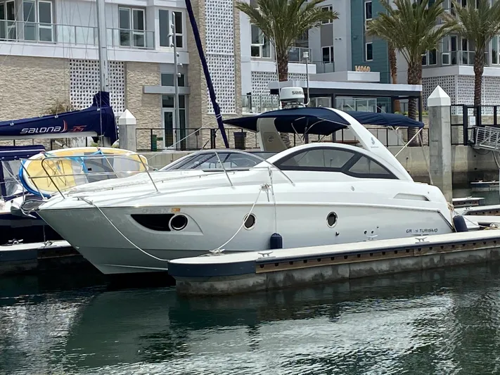  Yacht Photos Pics 2016 Beneteau GT35 yacht docked at a marina.