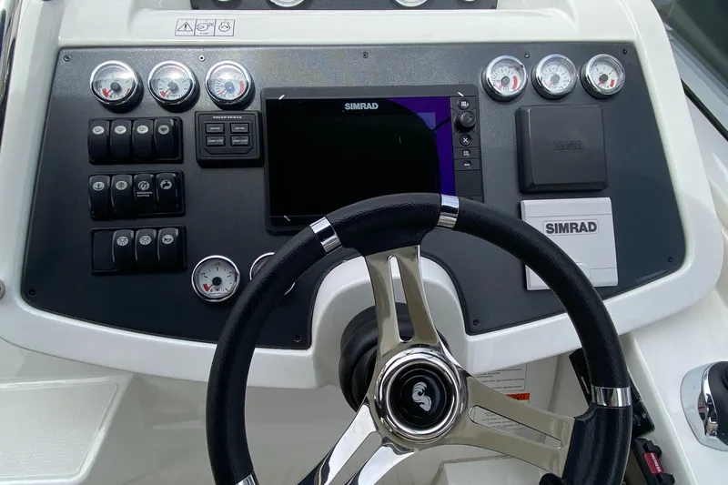  Yacht Photos Pics 2016 Beneteau GT35 helm with Simrad electronics and multifunction display.