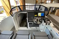 2023 Quarken 27 T-Top V2 boat interior with modern helm and navigation system.