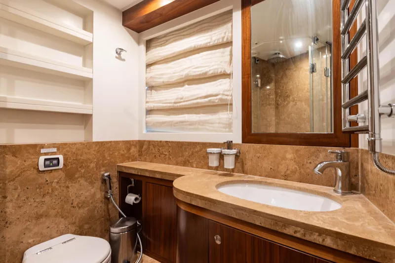 Firefly Yacht Photos Pics Luxurious yacht bathroom with marble accents, modern fixtures, and ample storage, Mulder 94, 2015.