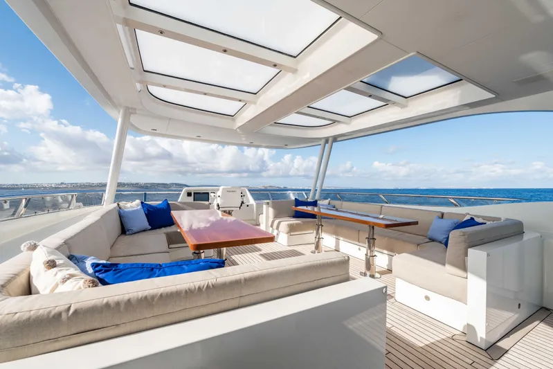 Firefly Yacht Photos Pics Luxurious Mulder 94 yacht deck with elegant seating, ocean view, and skylights, 2015 model.