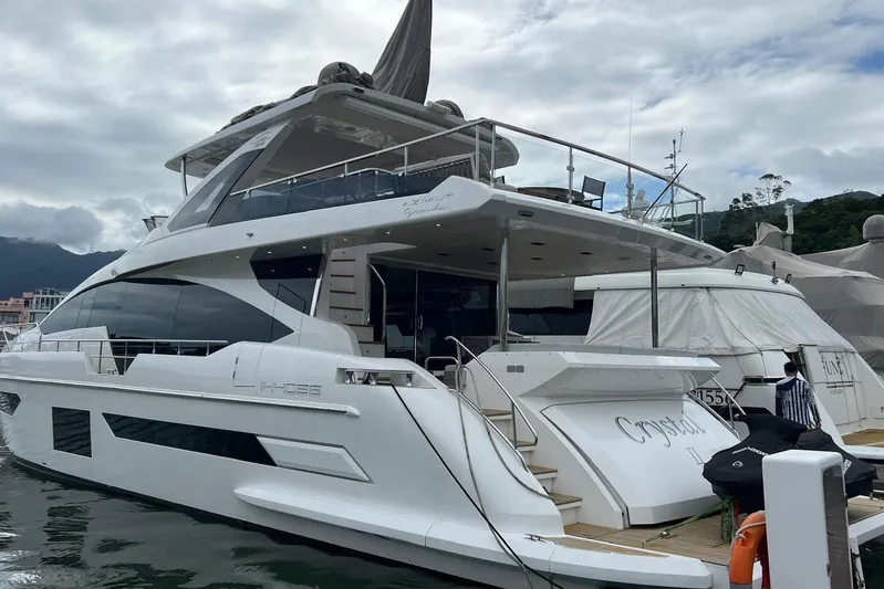  Yacht Photos Pics Luxury yacht Azimut Grande 25M 2020 docked at marina, showcasing sleek design and modern features.