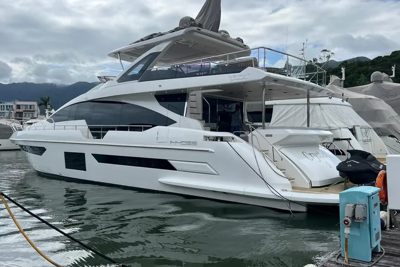  Yacht Photos Pics Luxury 2020 Azimut Grande 25M yacht docked at marina, showcasing sleek design and modern features.