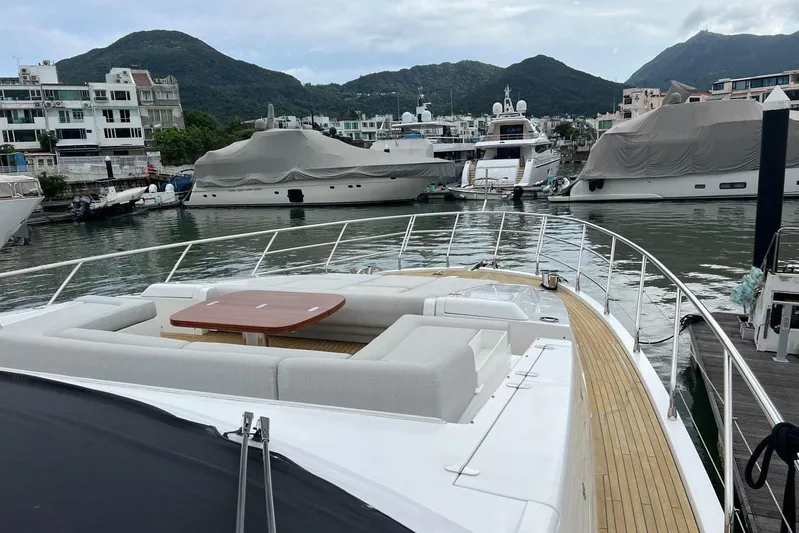  Yacht Photos Pics Luxurious 2020 Azimut Grande 25M yacht docked in scenic marina setting.
