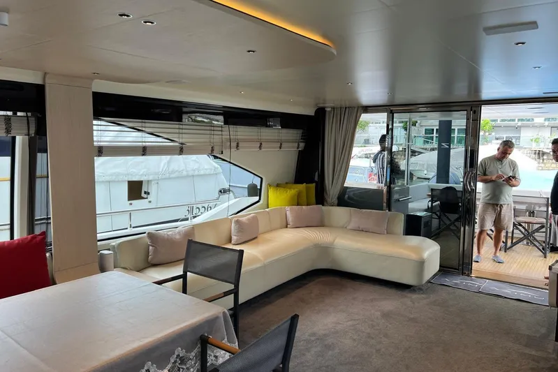  Yacht Photos Pics Luxurious interior of 2020 Azimut Grande 25M yacht with modern seating and large windows.