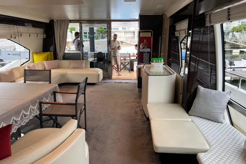  Yacht Photos Pics Luxurious interior of 2020 Azimut Grande 25M yacht with elegant seating and dining area.