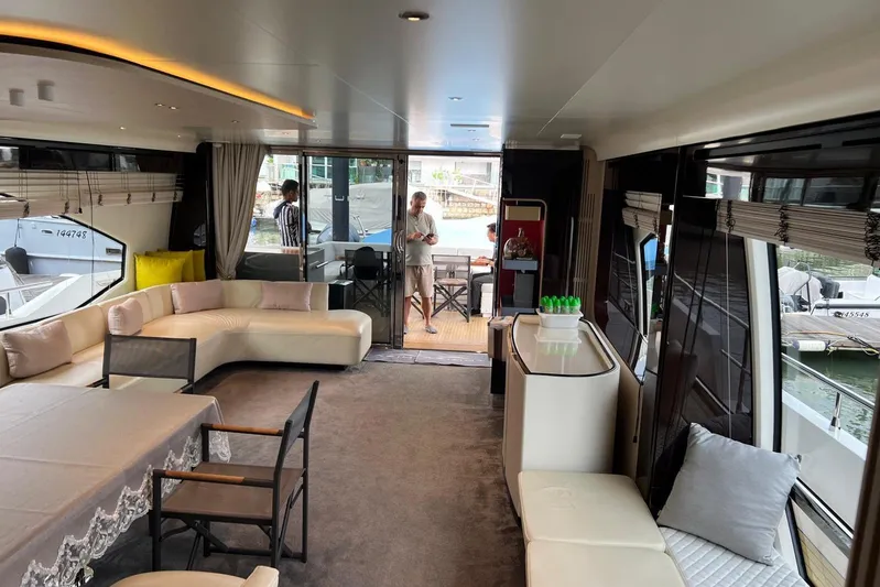  Yacht Photos Pics Luxurious interior of 2020 Azimut Grande 25M yacht with elegant seating and dining area.