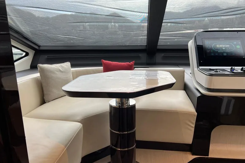  Yacht Photos Pics Luxurious interior of 2020 Azimut Grande 25M yacht with modern seating and control panel.