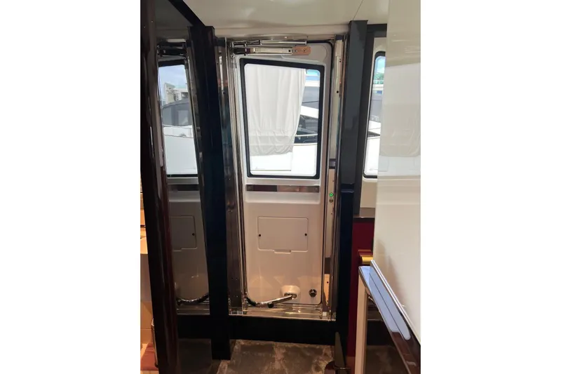  Yacht Photos Pics Interior view of 2020 Azimut Grande 25M yacht door and window.