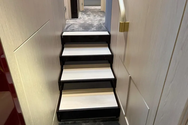  Yacht Photos Pics Staircase inside 2020 Azimut Grande 25M yacht, featuring sleek modern design and luxurious finishes.