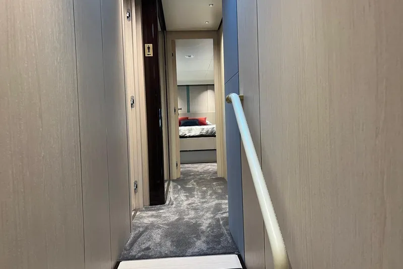  Yacht Photos Pics Interior hallway of 2020 Azimut Grande 25M yacht, featuring modern design and luxurious decor.