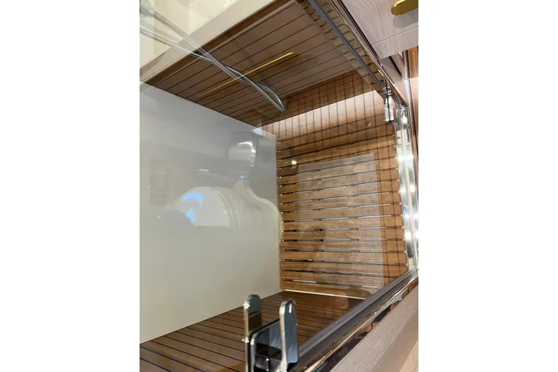  Yacht Photos Pics Interior view of 2020 Azimut Grande 25M yacht with sleek wooden flooring.