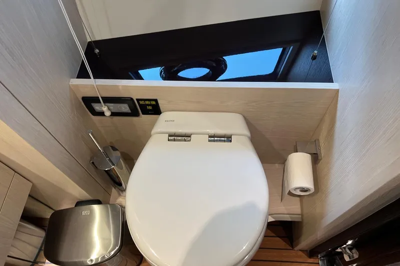  Yacht Photos Pics Luxury yacht Azimut Grande 25M 2020 bathroom with modern toilet and sleek design.