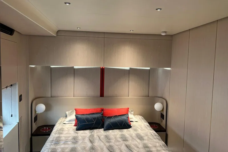  Yacht Photos Pics Luxurious bedroom interior of 2020 Azimut Grande 25M yacht with modern design and elegant lighting.