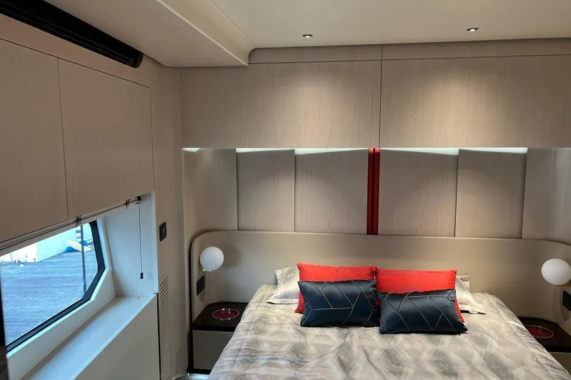  Yacht Photos Pics Luxurious bedroom interior of 2020 Azimut Grande 25M yacht with modern design elements.