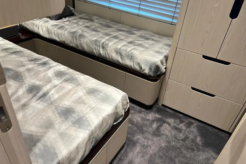  Yacht Photos Pics Twin beds in a luxurious 2020 Azimut Grande 25M yacht cabin.
