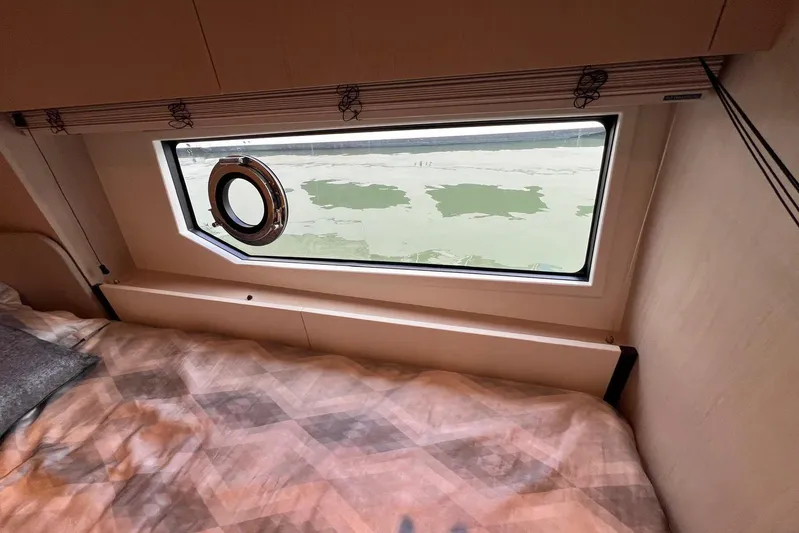  Yacht Photos Pics Interior view of Azimut Grande 25M yacht cabin with window, 2020 model.