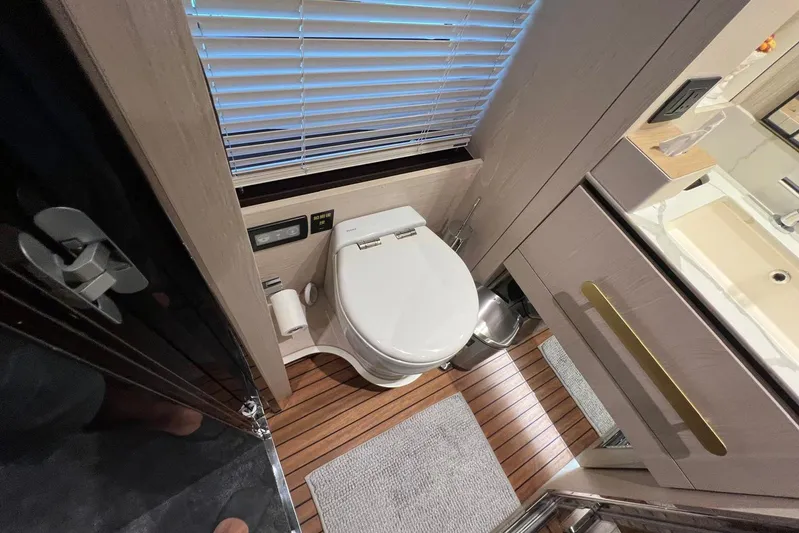  Yacht Photos Pics Luxury yacht bathroom with modern fixtures on Azimut Grande 25M, 2020 model.