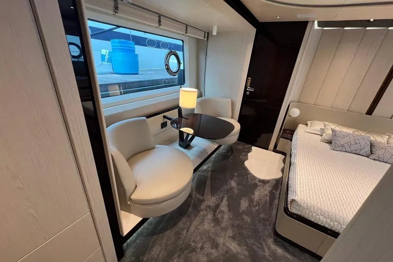 Yacht Photos Pics Luxurious interior of 2020 Azimut Grande 25M yacht with elegant seating and bed.