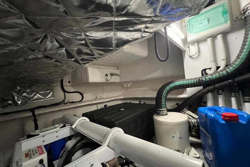  Yacht Photos Pics Engine room of 2020 Azimut Grande 25M yacht with insulated ceiling and various equipment.