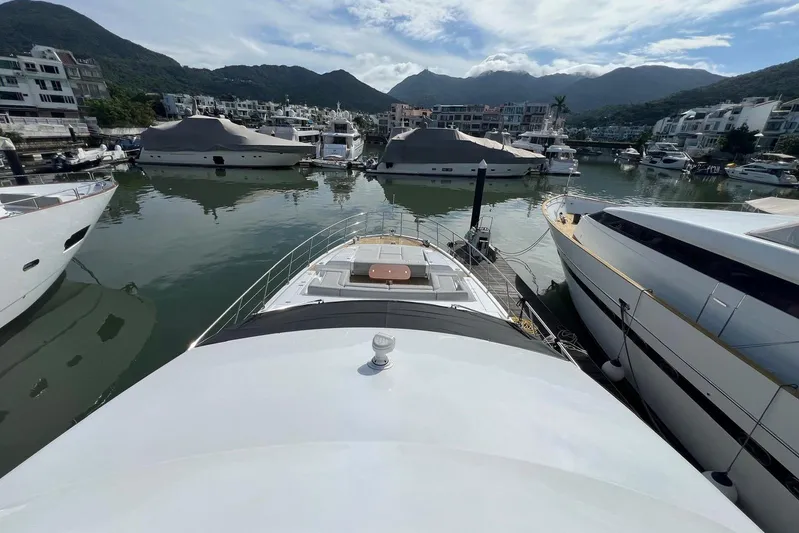  Yacht Photos Pics Luxury yacht Azimut Grande 25M, 2020 model, docked in a scenic marina.