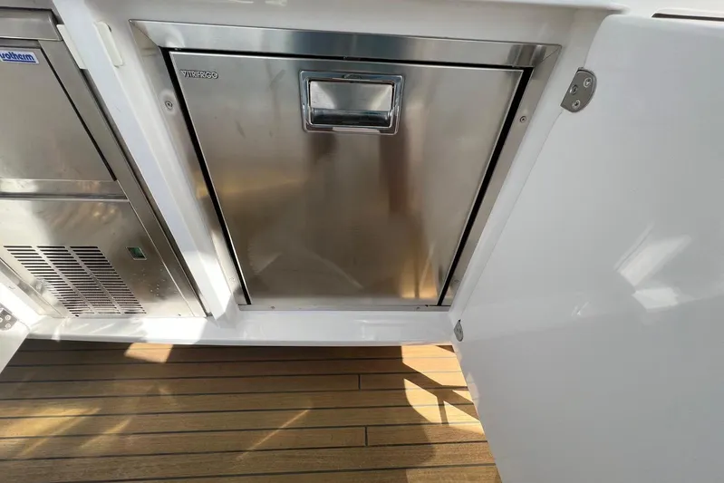  Yacht Photos Pics Stainless steel appliance on Azimut Grande 25M yacht, 2020 model, with wooden flooring.