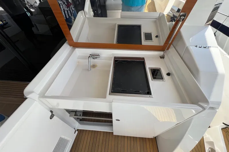  Yacht Photos Pics Outdoor kitchen area on 2020 Azimut Grande 25M yacht with sink and grill.