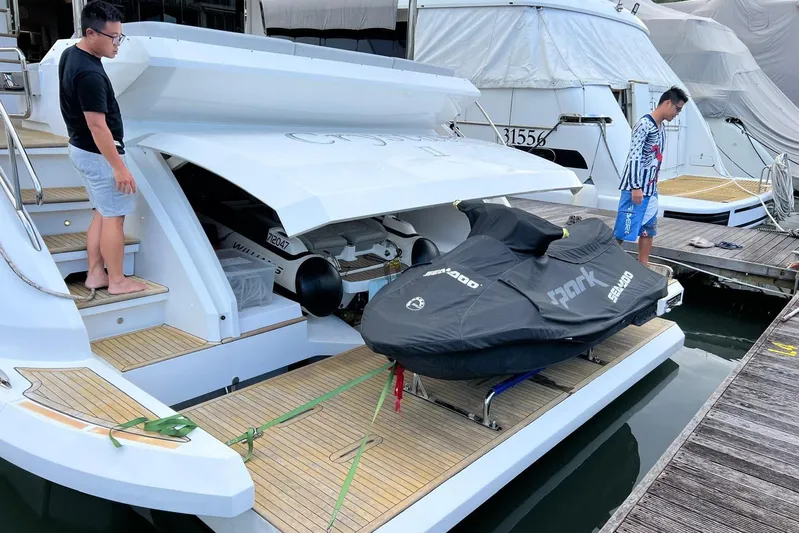  Yacht Photos Pics 2020 Azimut Grande 25M yacht with jet ski on deck at marina.