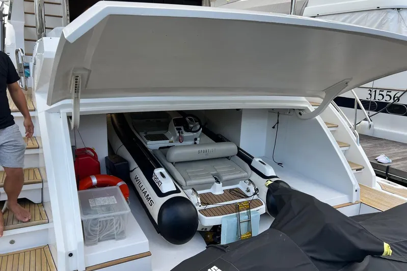  Yacht Photos Pics 2020 Azimut Grande 25M yacht with Williams tender in storage compartment.