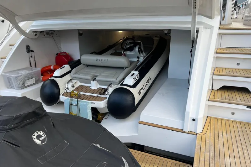  Yacht Photos Pics Luxury yacht Azimut Grande 25M 2020 with Williams Sportjet tender in storage compartment.