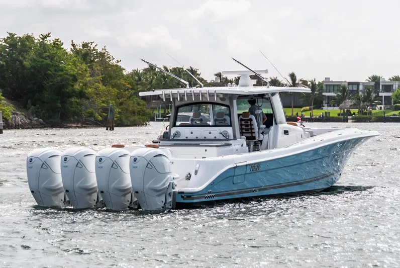 Relentless Yacht Photos Pics 2021 HCB 53 Sueños boat with multiple engines cruising on a sunny day.