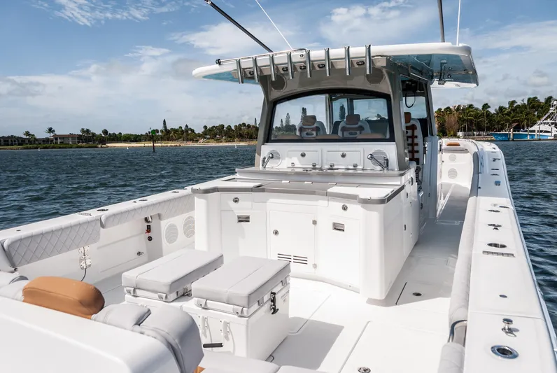 Relentless Yacht Photos Pics 2021 HCB 53 Sueños luxury boat interior with seating and ocean view.