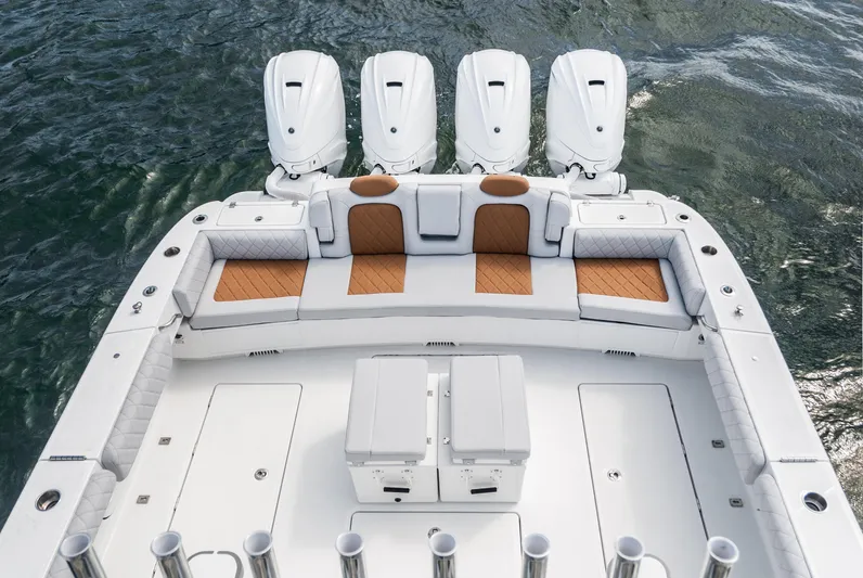 Relentless Yacht Photos Pics 2021 HCB 53 Sueños boat with quad engines and luxurious seating on the water.