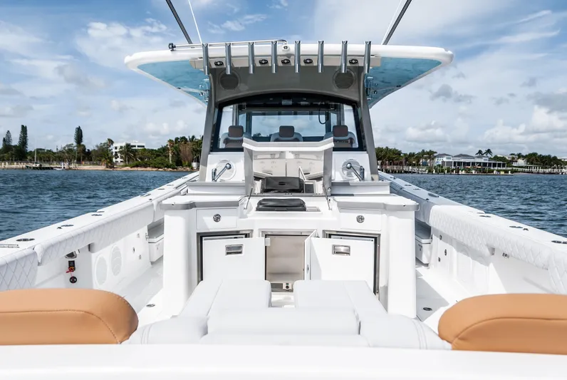 Relentless Yacht Photos Pics 2021 HCB 53 Sueños luxury boat interior with seating and ocean view.